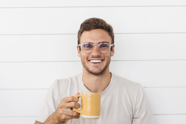 guy wearing blue light glasses