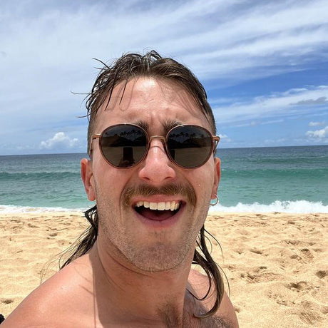 man at the beach in baia