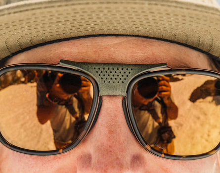 close up of sunski ferrata olive centerpiece on sunglasses