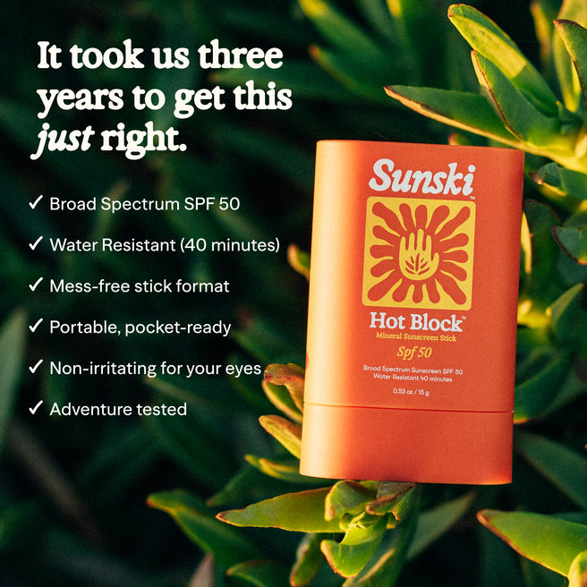 Hot Block SPF 50 Sunscreen - 0.53 oz / 15 g - Sunski Hot Block sunscreen stick with green leaves in the background