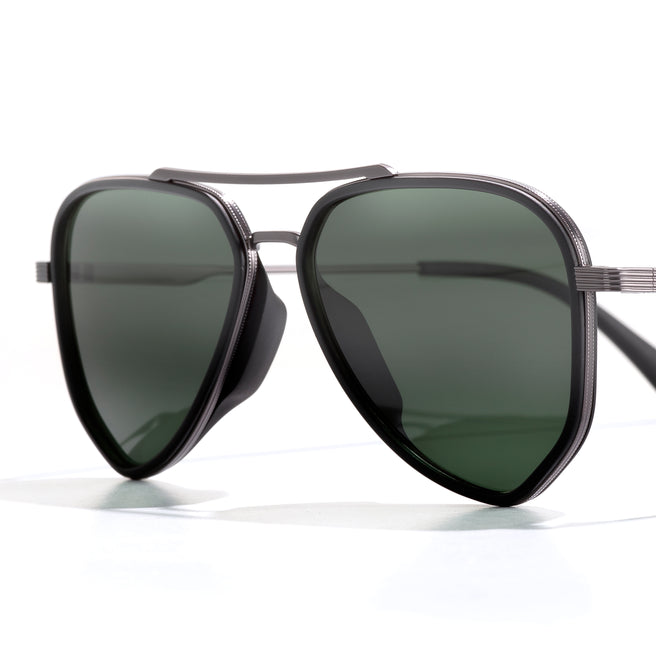 Sunglasses with dark lenses and thin metal frame on a white background