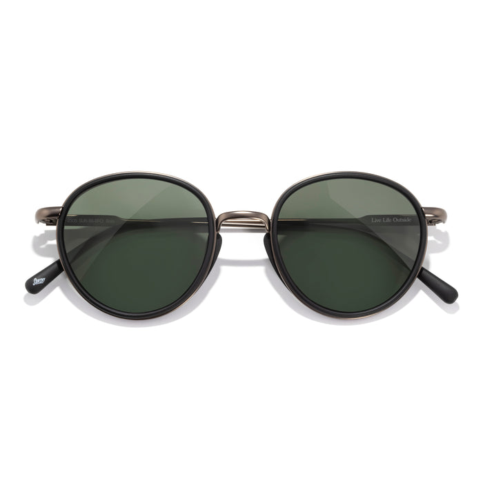 Round sunglasses with dark lenses on a white background