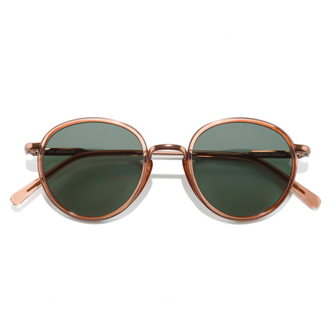 Baia - Copper Forest - Sunglasses with rose gold frame and dark lenses on a white background