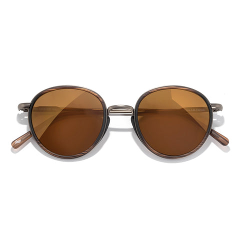 Baia - Wire Tortoise Bronze - Round sunglasses with brown lenses and gold frames on a white background