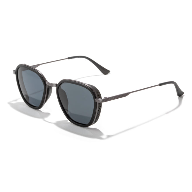 Sunglasses with dark lenses and thin metal frame on a white background