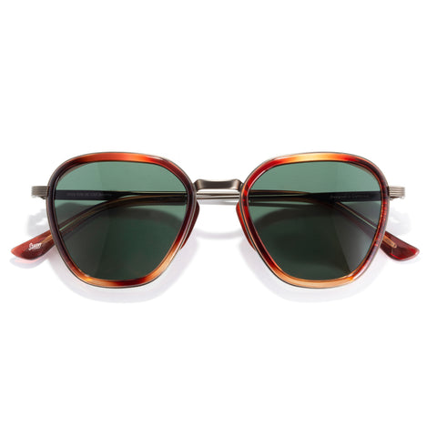 Bernina - Caramel Forest - Sunglasses with tortoiseshell frame and green lenses on a white background