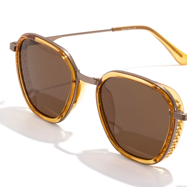 Gold-framed sunglasses with brown lenses on a white background