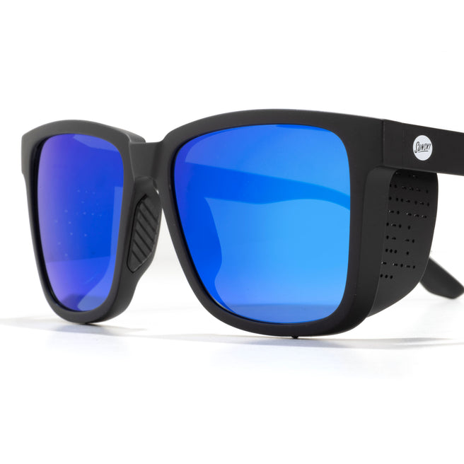Black sunglasses with blue lenses on a white background