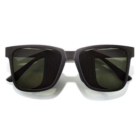Couloir - Black Forest - Black sunglasses with dark lenses on a white background