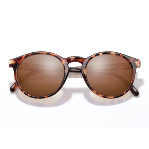 Dipsea - Tortoise Amber - Sunglasses with tortoiseshell frame and brown lenses on a white background