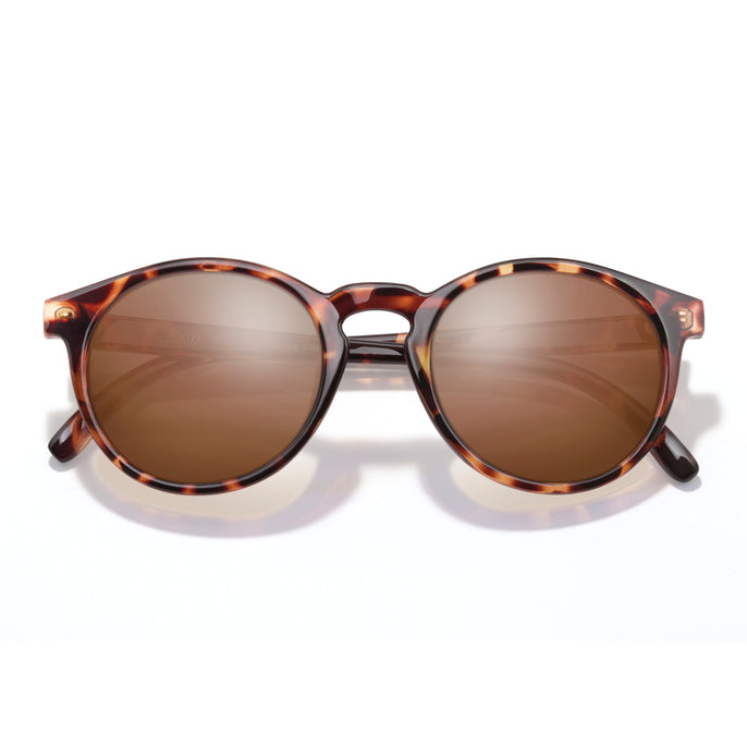 Dipsea - Tortoise Amber - Sunglasses with tortoiseshell frame and brown lenses on a white background