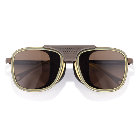 Ferrata - Olive Citrine Amber - Sunglasses with gold frame and brown lenses on a white background