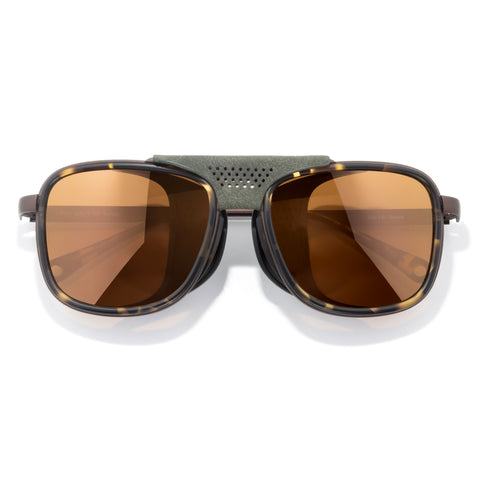 Ferrata - Tortoise Bronze - Sunglasses with brown lenses and a green frame on a white background