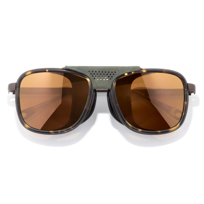 Ferrata - Tortoise Bronze - Sunglasses with brown lenses and a green frame on a white background