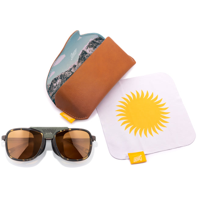 Sunglasses with a carrying hard case, and a microfiber cloth with a sun design.