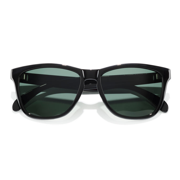 Headland - Black Forest - Black sunglasses with green lenses on a white background