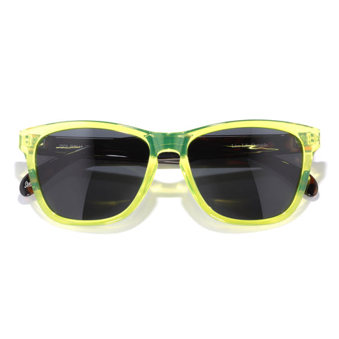 Headland - Lime Tortoise Slate - Sunglasses with yellow frame and dark lenses on a white background