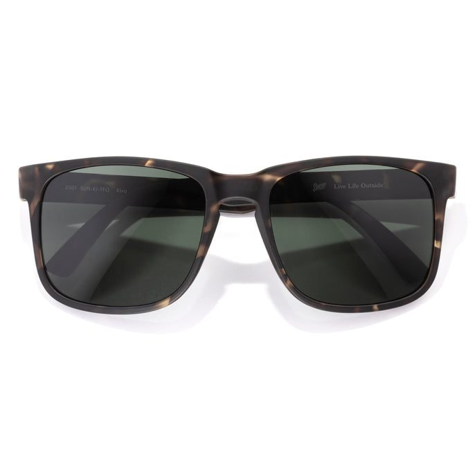 Kiva - Tortoise Forest - Sunglasses with tortoiseshell frame and dark lenses on a white background