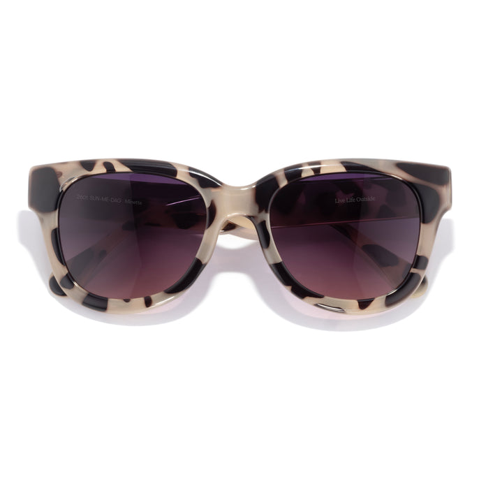 Minette - Tortoise Afterglow - Sunglasses with tortoiseshell frame and dark lenses on a white background