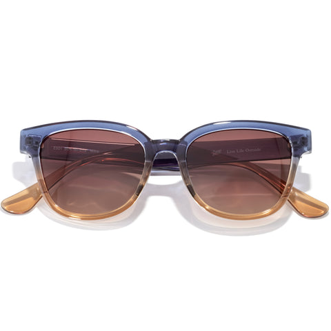 Miho - Dawn Terra Fade - Sunglasses with a blue frame and brown lenses on a white background