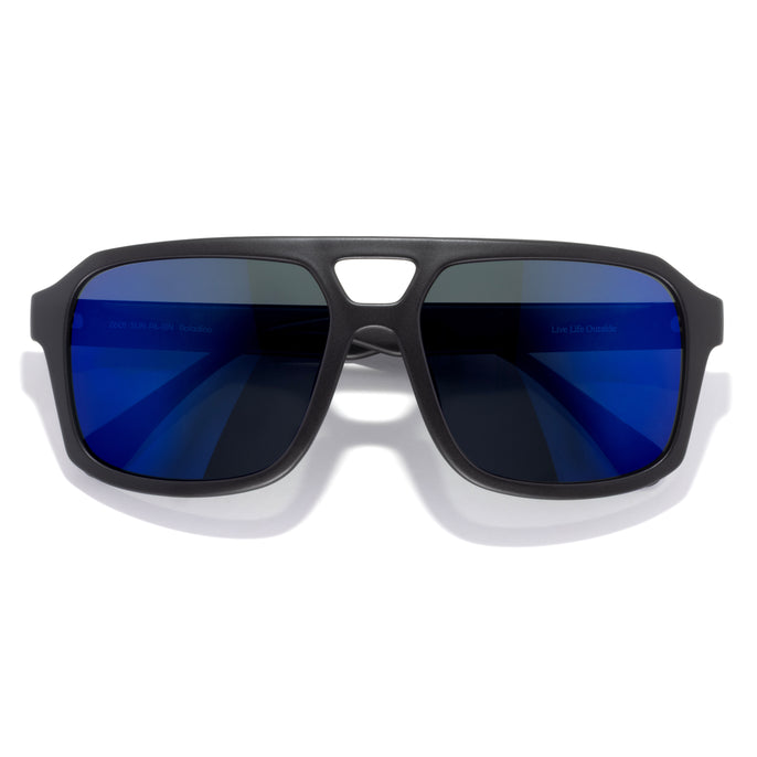Paladino - Black Indigo - Sunglasses with blue lenses and black frame on a white background