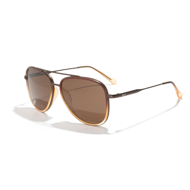 Sunglasses with gold frame and brown lenses on a white background