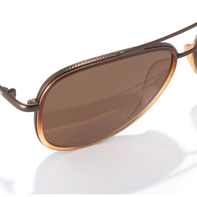 Brown aviator sunglasses on a white background