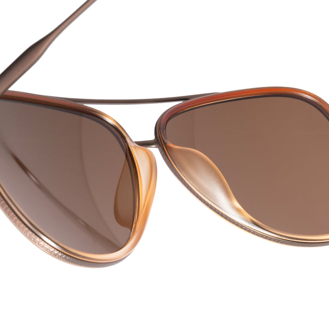 Brown sunglasses with a white background