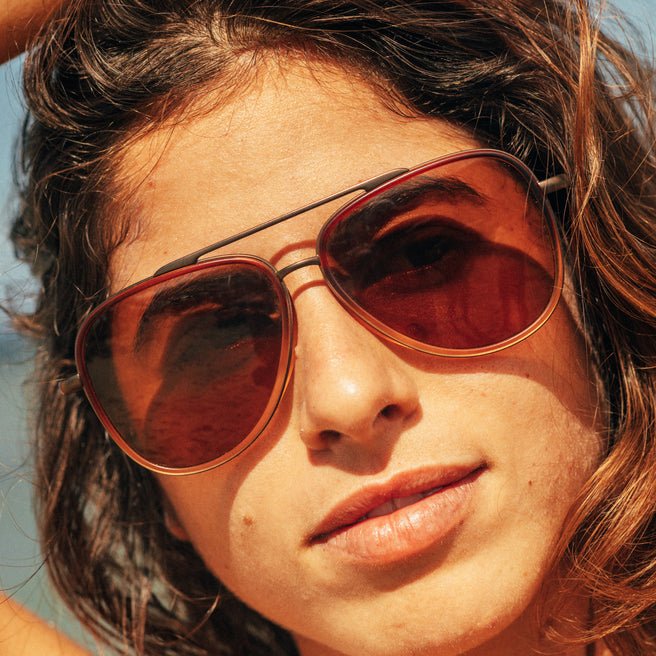 woman wearing aviator sunglasses