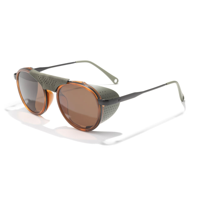 Sunglasses with brown lenses and green frame on a white background