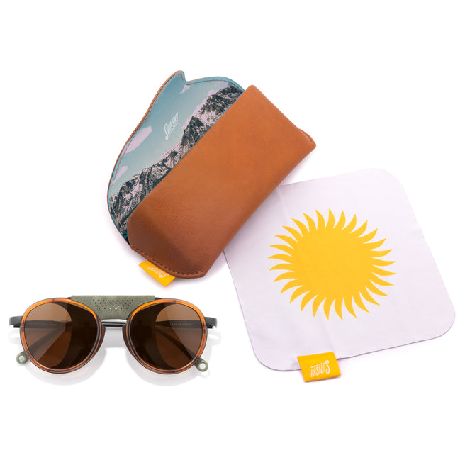 Sunglasses with a carrying hard case, and a microfiber cloth with a sun design.