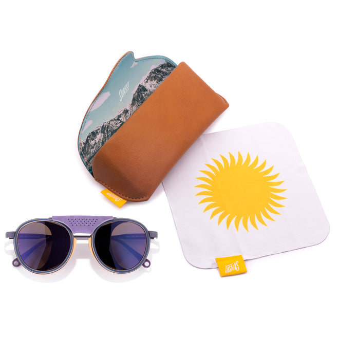 Sunglasses with a carrying hard case, and a microfiber cloth with a sun design.
