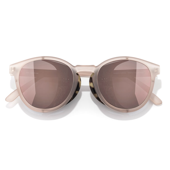 Sunglasses with a beige frame and brown lenses on a white background