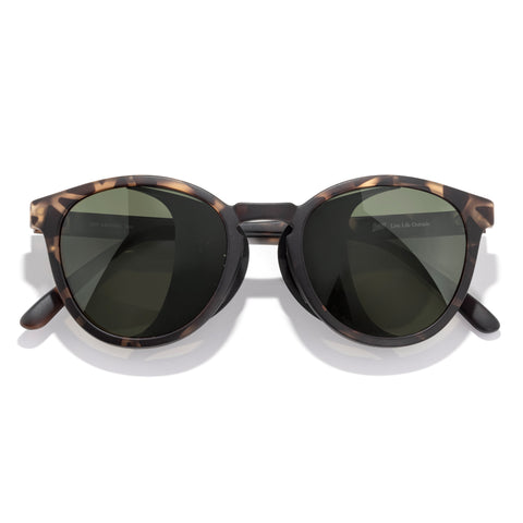 Tera - Tortoise Forest - Sunglasses with tortoiseshell frame and dark lenses on a white background