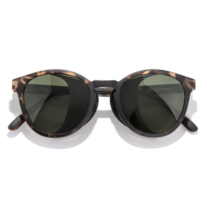 Tera - Tortoise Forest - Sunglasses with tortoiseshell frame and dark lenses on a white background