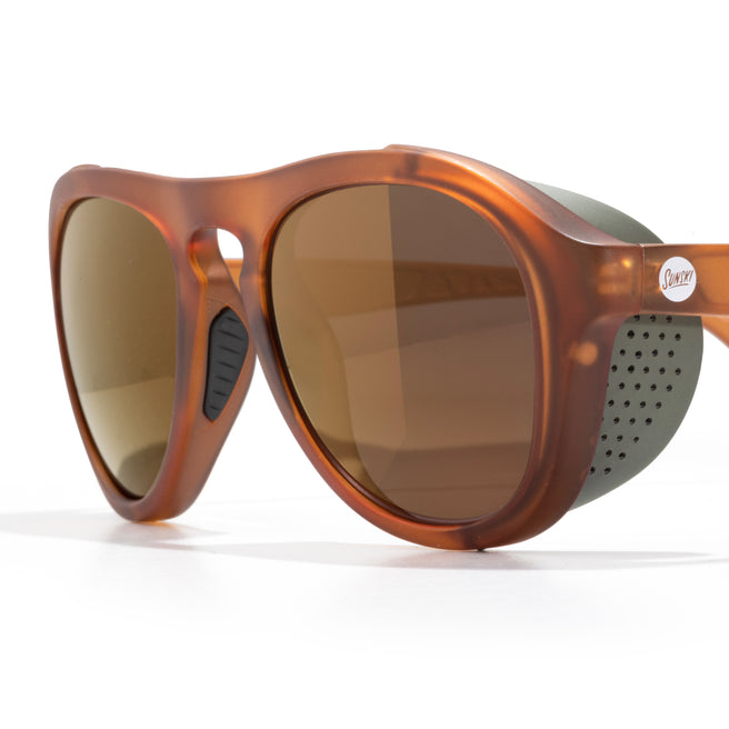 Brown sunglasses with a white background