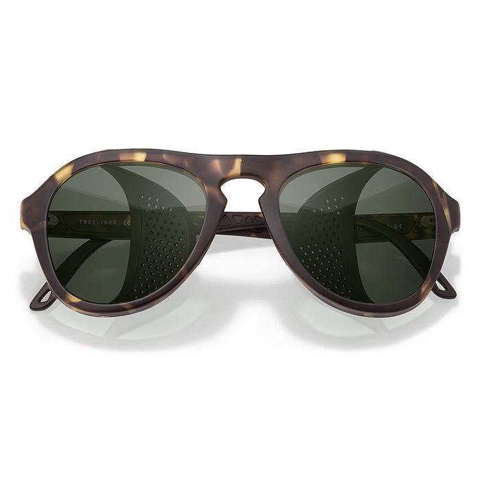 Sunglasses with tortoiseshell frame and dark lenses on a white background