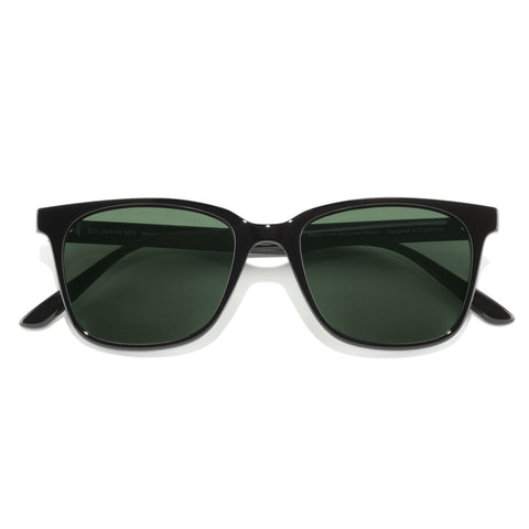 Ventana - Black Forest - Black sunglasses with green lenses on a white background