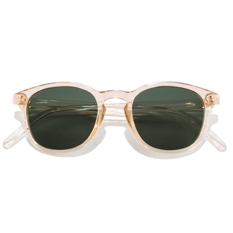 Yuba - Champagne Forest - Sunglasses with gold frame and green lenses on a white background