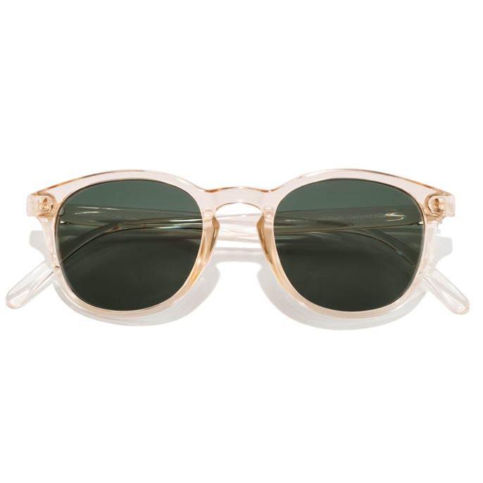Yuba - Champagne Forest - Sunglasses with gold frame and green lenses on a white background