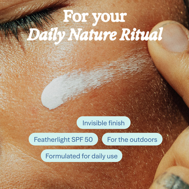 Sol Power SPF 50 Sunscreen - 1.7 Fl oz / 50 mL - Close-up of skin with sunscreen application and text about daily nature ritual, invisible finish, featherlight SPF 50, for the outdoors, and daily use.