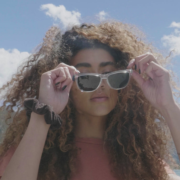 woman trying on headland sunglasses