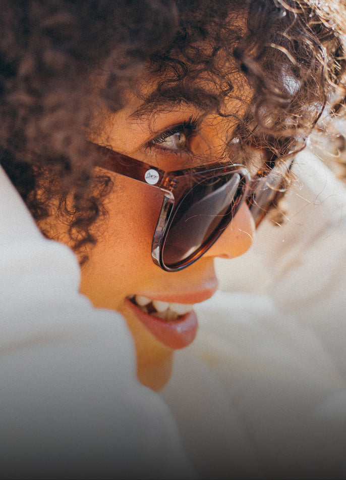 woman wearing makani sunglasses