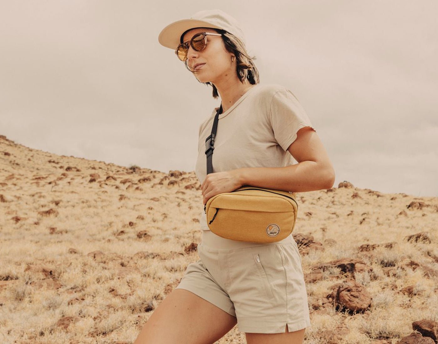 girl hiking wearing sunski sling