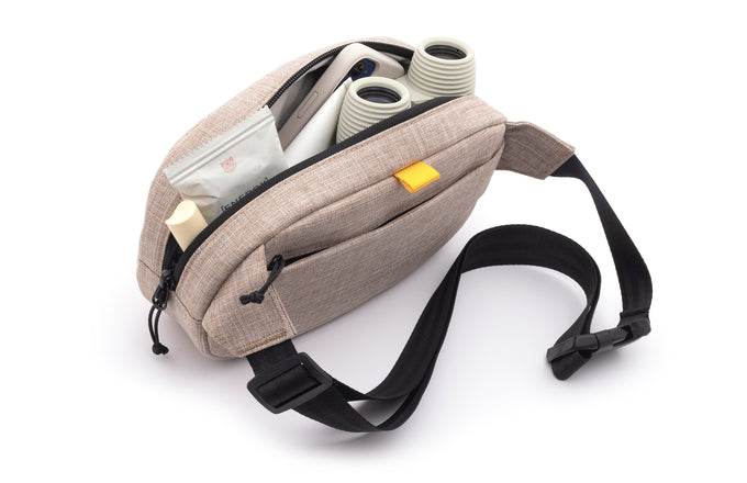 sunski carry sling sand open with items showing